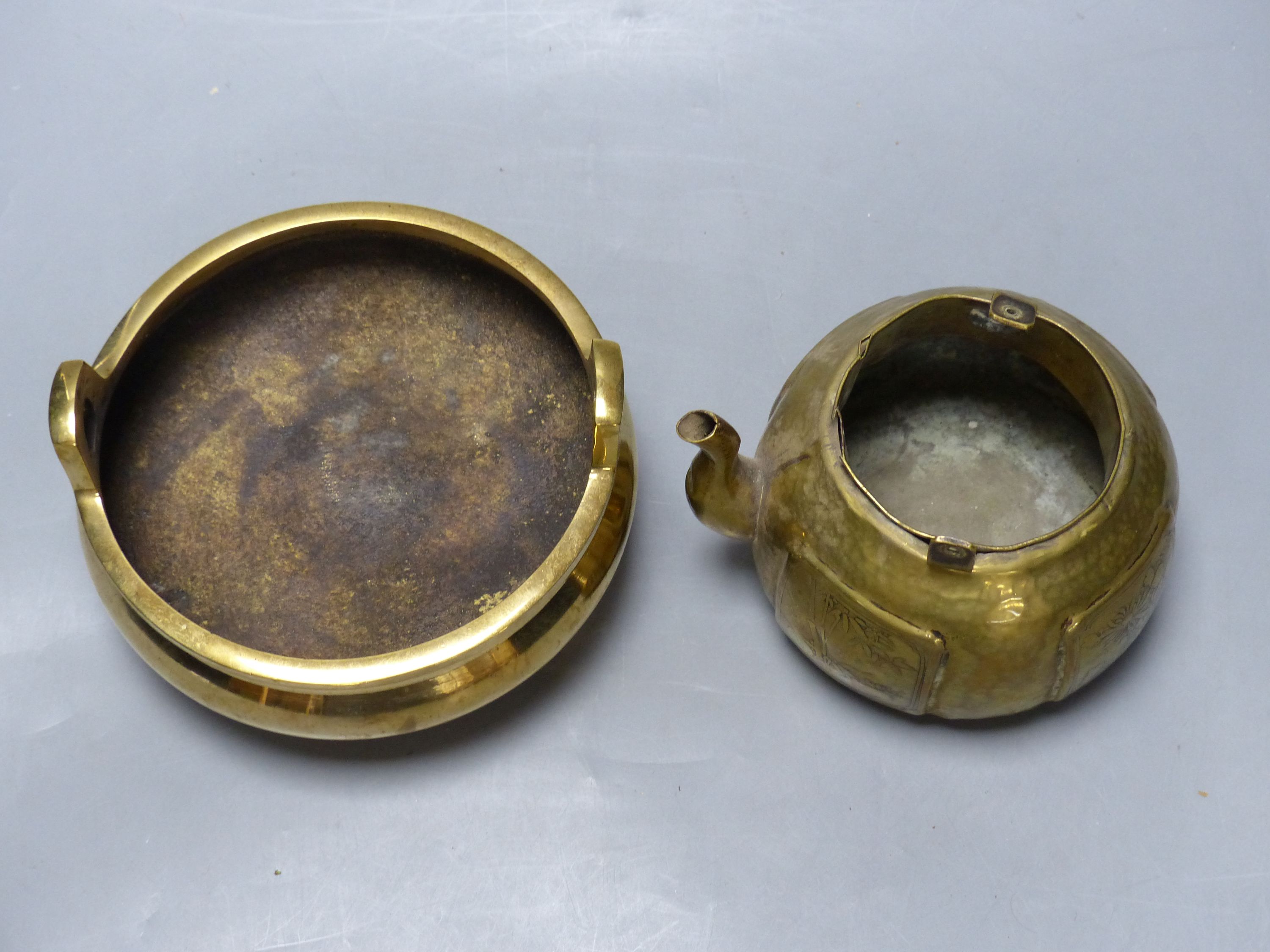 A Chinese bronze censor with Xuande mark, diameter 15cm, and a brass tea pot